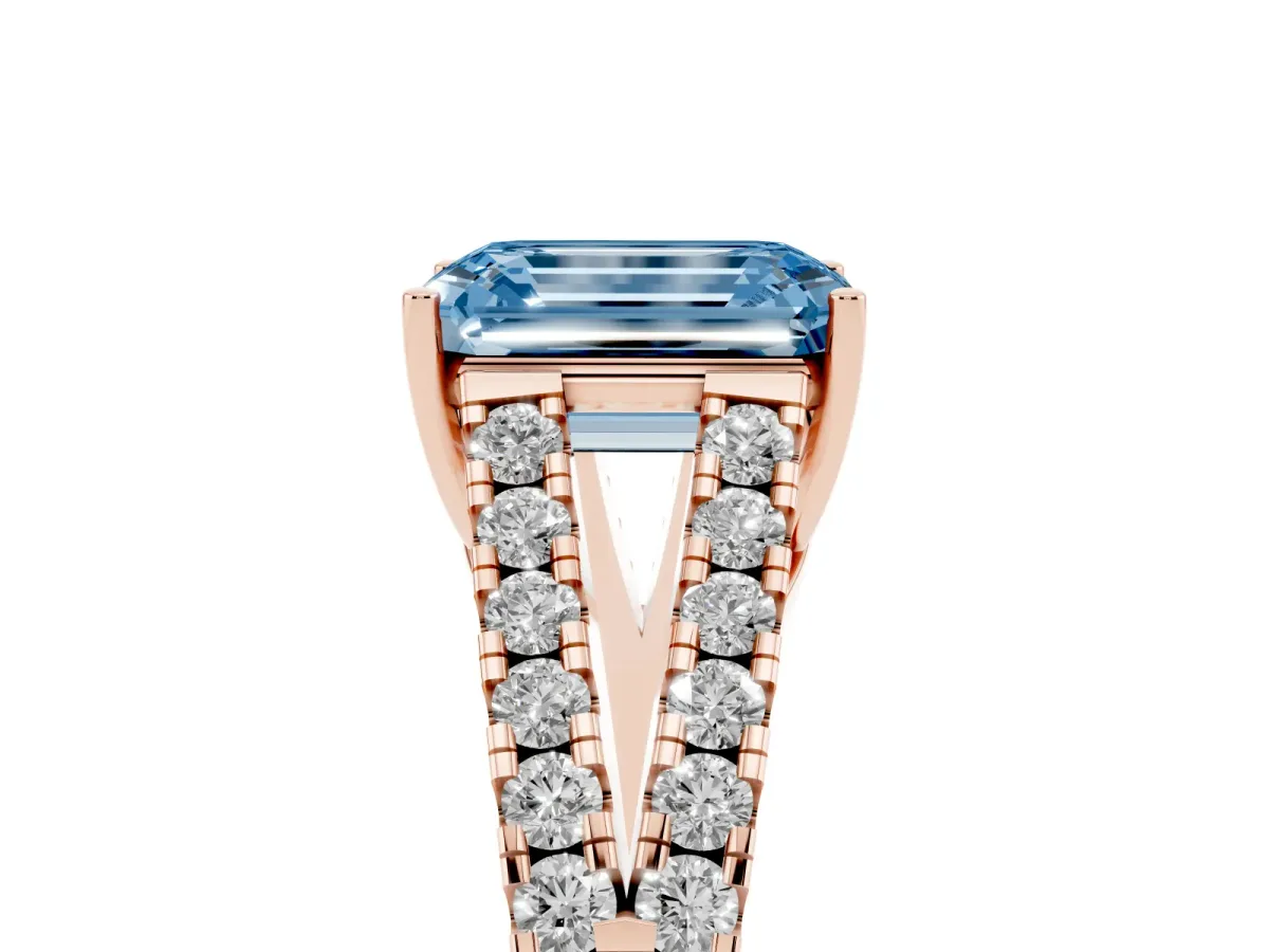 Fancy Blue Emerald Cut Diamond Split Shank Pavé Engagement Ring with Four-Prong Setting Rose gold