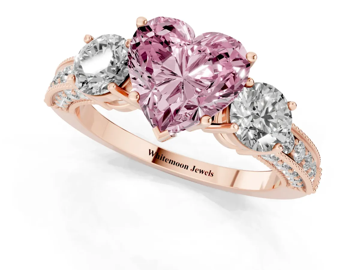 Fancy Pink Heart Cut Three-Stone Diamond Ring with Pavé Band and Four-Prong Setting Rose gold