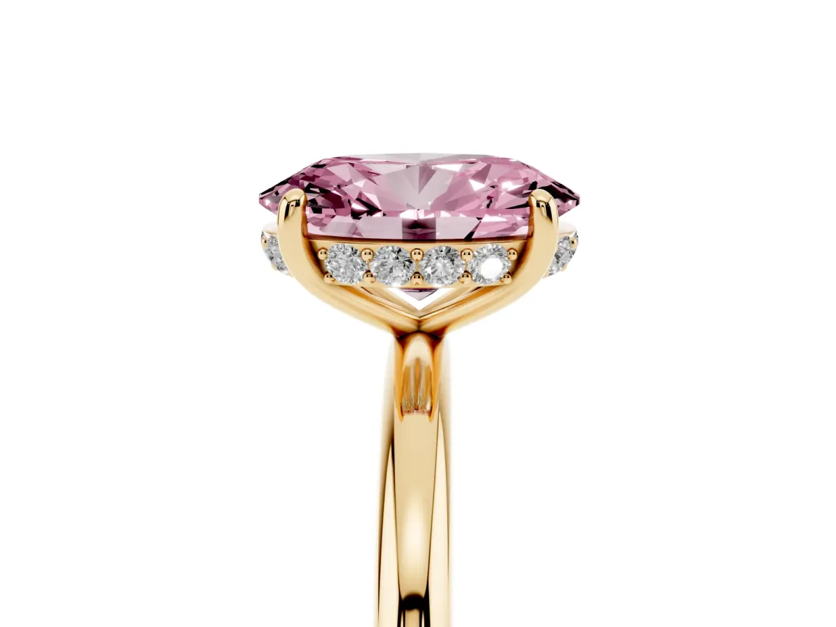 Fancy Pink Oval Cut Solitaire Diamond Ring with a Classic Band and Four-Prong Setting Yellow gold