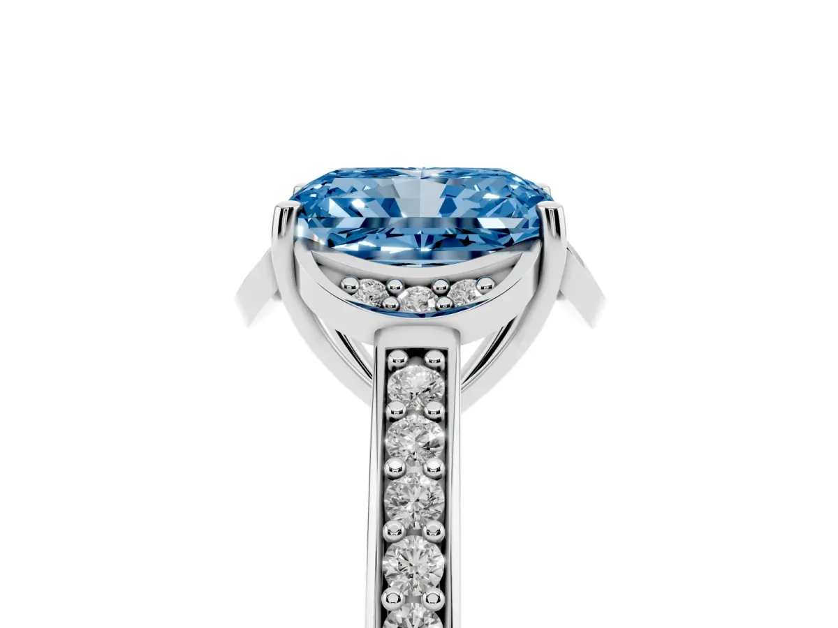 Fancy Blue Radiant Cut Cut Halo Diamond Ring with Channel Set Band and Four-Prong Setting White gold