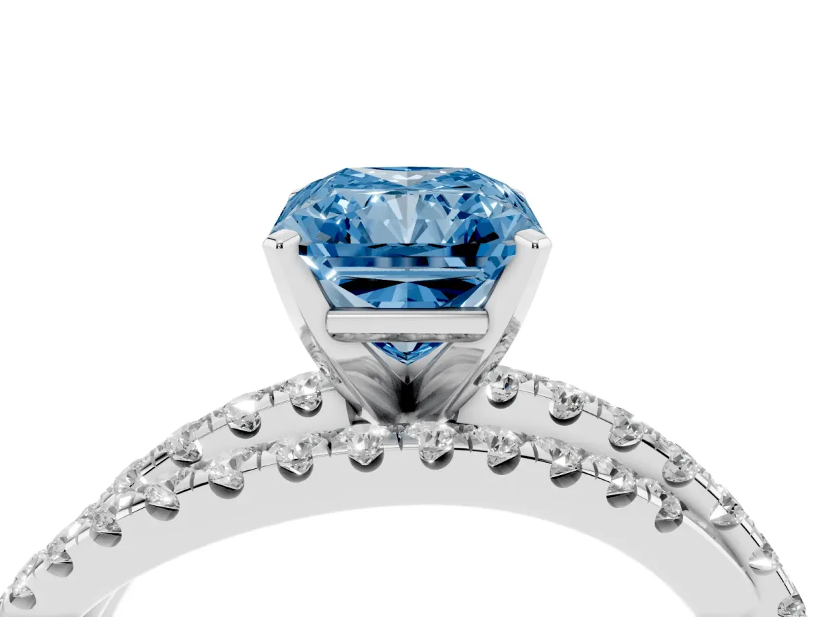 Fancy Blue Radiant Cut Solitaire Twist Band with Pavé Setting and Four-Prong Setting Silver