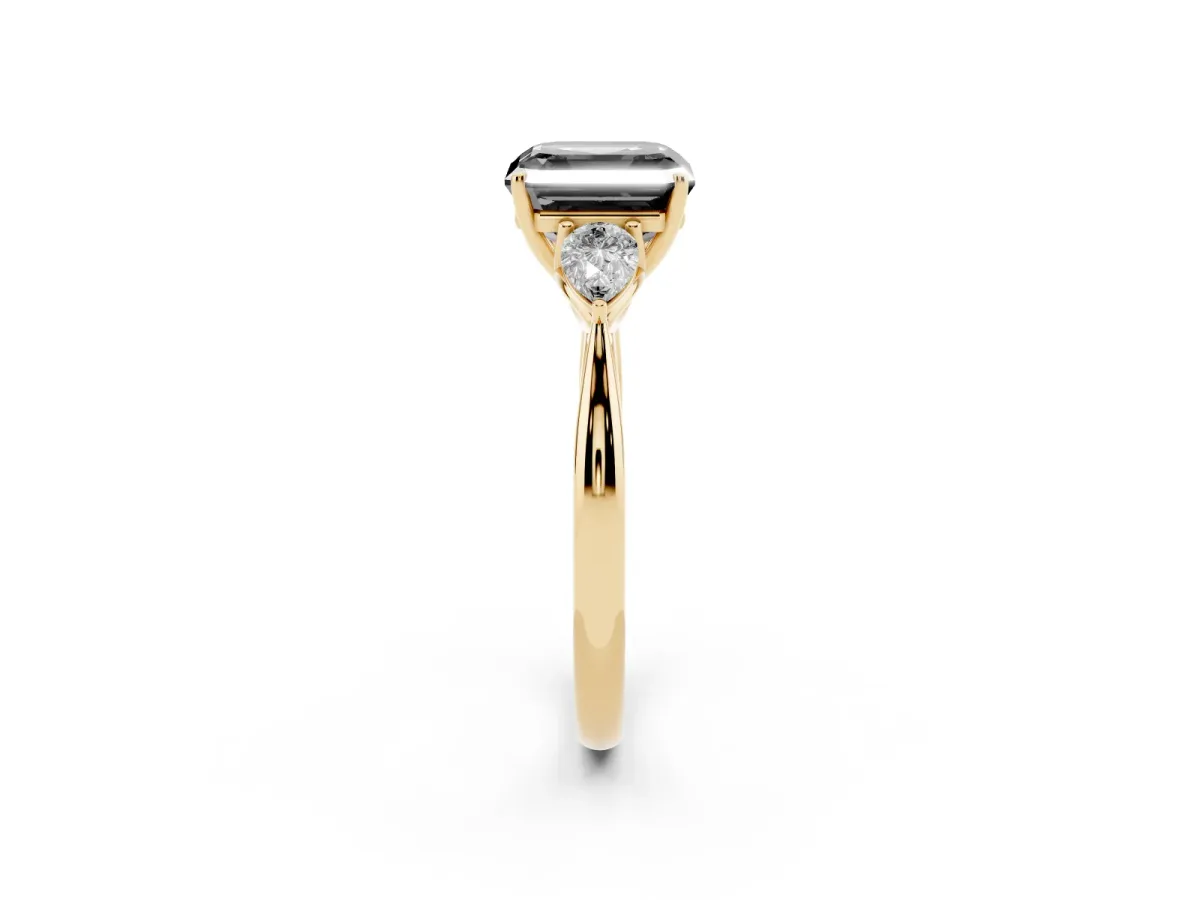Fancy Black Asscher Cut Diamond Three-Stone Ring with Pear Side Stones and Prong Setting Yellow gold
