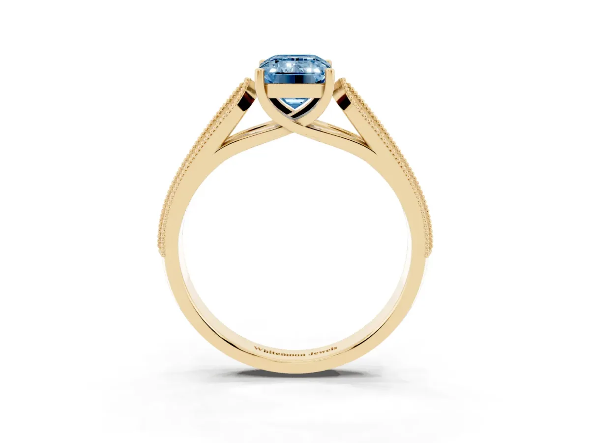 Fancy Blue Emerald Cut Cut Pave Split Shank Engagement Ring with Four-Prong Setting Yellow gold