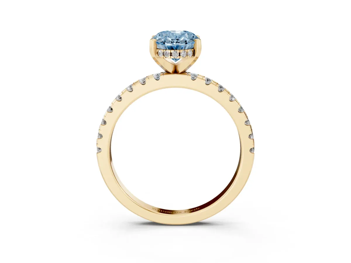 Fancy Blue Oval Cut Diamond Solitaire Ring with Round Pavé Band and Four-Prong Setting Yellow gold