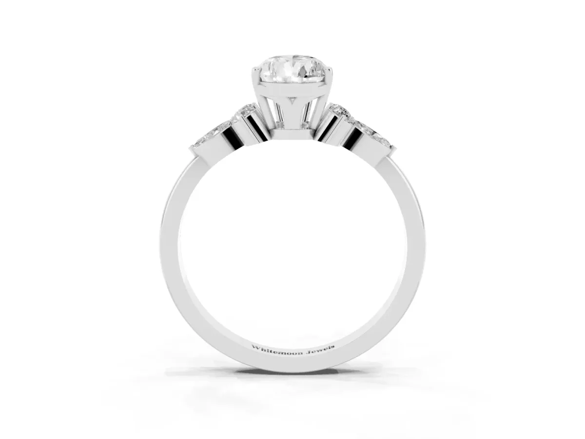 Pear Cut Brilliant Diamond Solitaire Ring with Pear Side Stones and Four-Prong Setting Silver