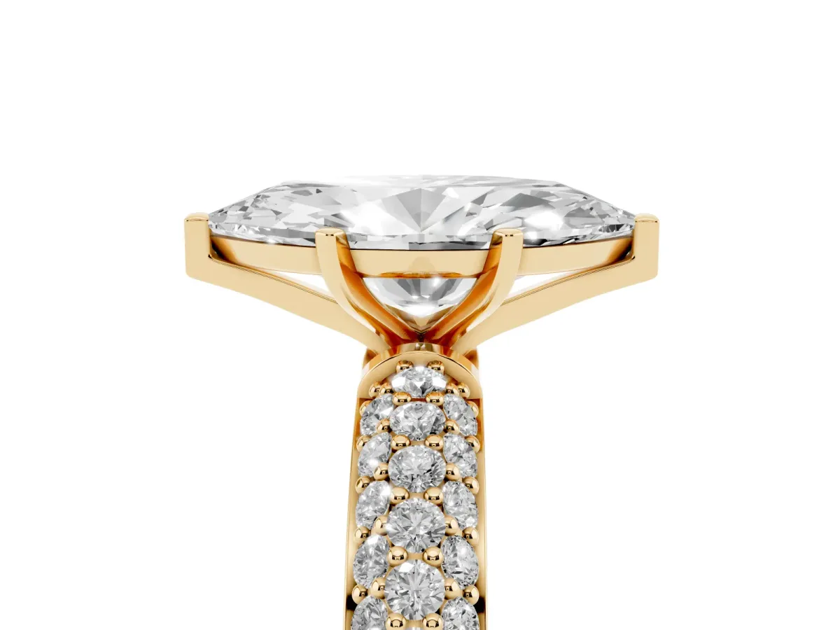 Marquise Cut Diamond Solitaire Ring with Prong Setting and Pavé Band Yellow gold