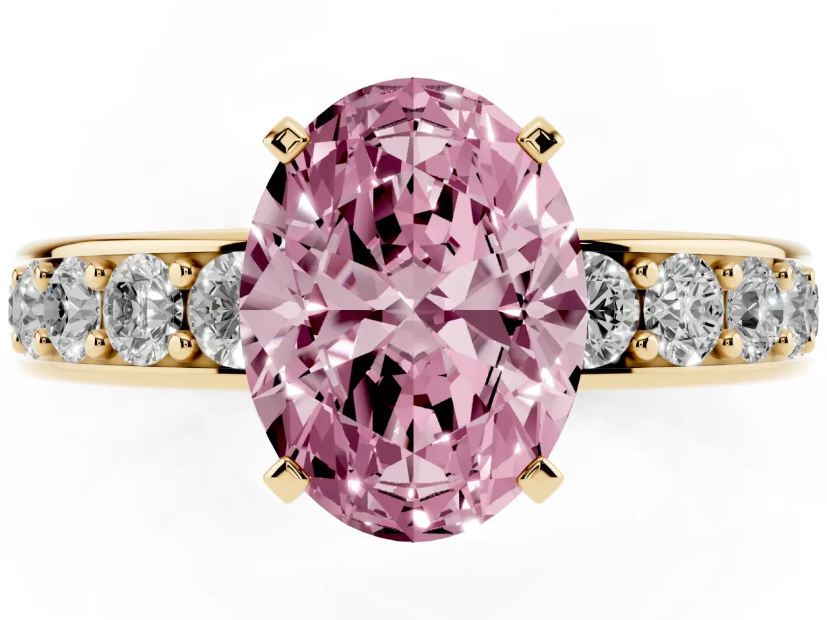 Fancy Pink Oval Cut Diamond Engagement Ring with Channel Set Round Band and Prong Setting Yellow gold
