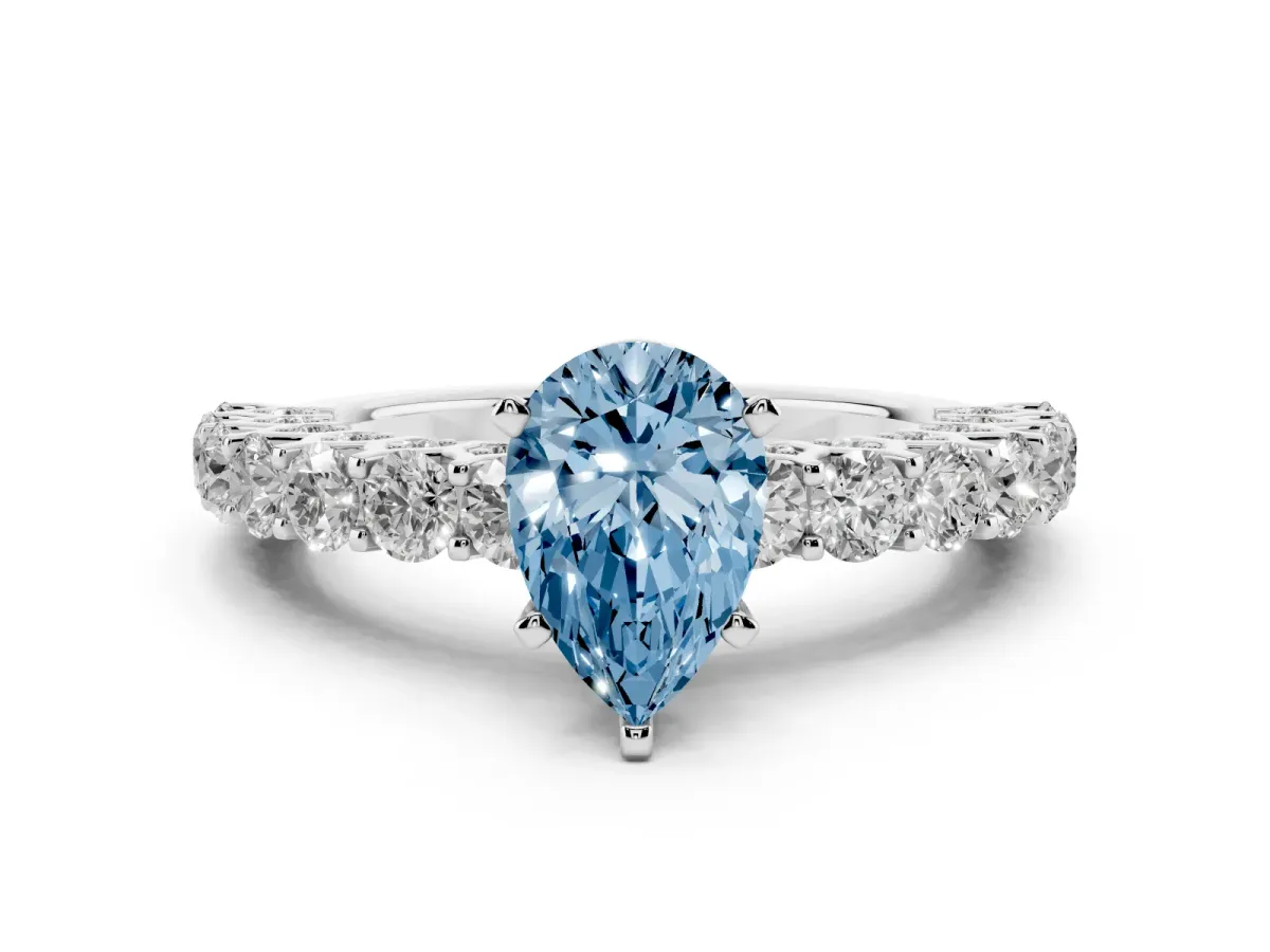 Fancy Blue Pear Cut Diamond Solitaire Ring with Shared Prong Pavé Band and Four-Prong Setting Silver
