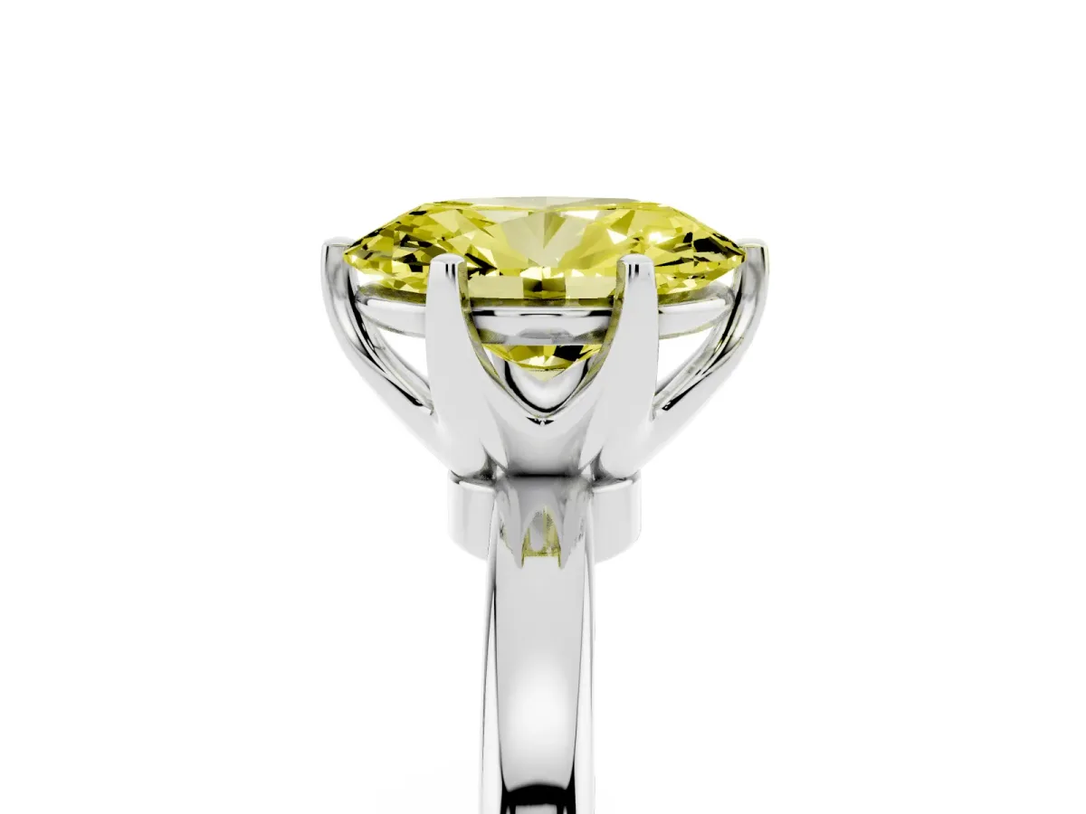 Fancy Yellow Oval Cut Solitaire Diamond Ring with Six-Prong Setting on a Classic Band Silver