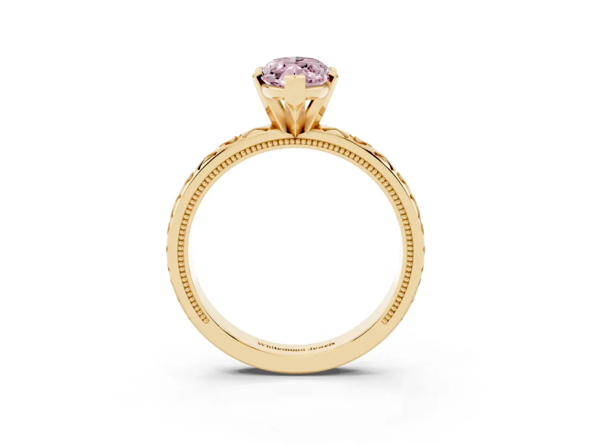 Fancy Pink Marquise Cut Solitaire Diamond Engagement Ring with XO Engraved Band and Four-Prong Setting Yellow gold