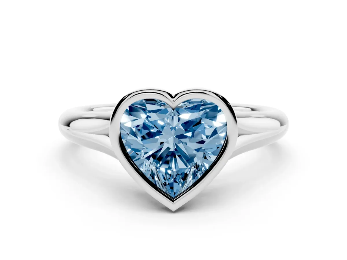 Fancy Blue Bezel Set Heart Cut Solitaire Diamond Ring with Smooth Band Platinum