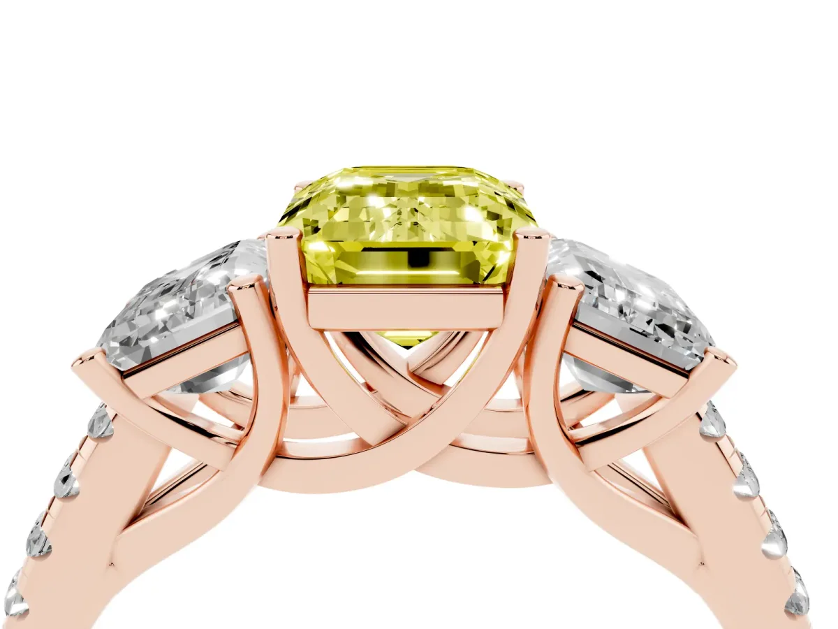 Fancy Yellow Three-Stone Emerald Cut Diamond Ring with Round Pavé Band and Prong Setting Rose gold