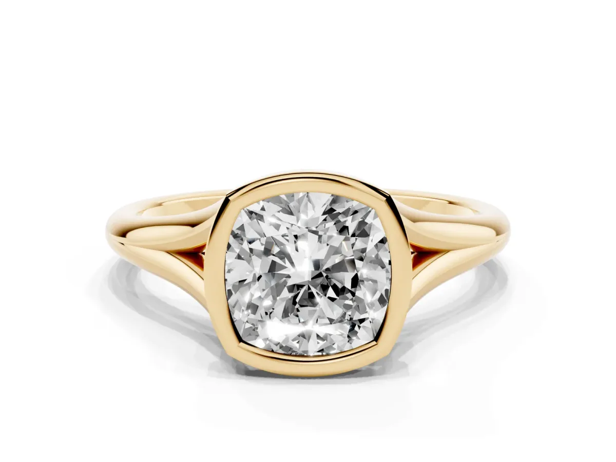 Bezel Set Cushion Cut Cut Solitaire Ring with Tapered Band Yellow gold