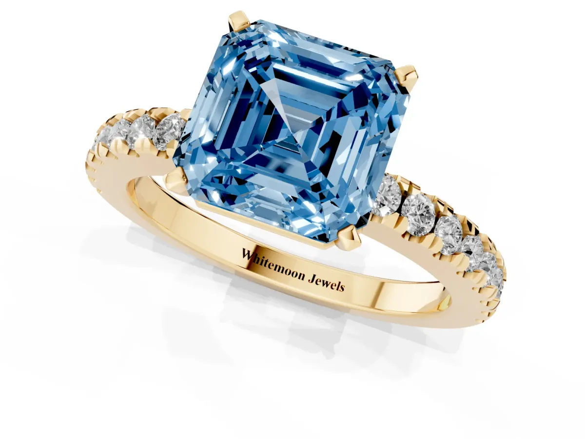 Fancy Blue Asscher Cut Solitaire Diamond with Pavé Band and Four-Prong Setting Yellow gold
