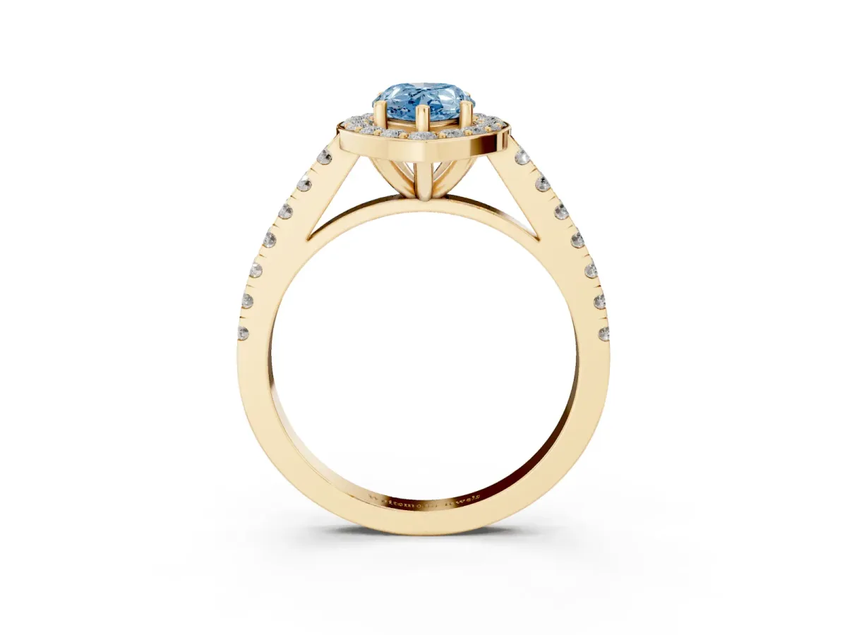 Fancy Blue Pear Cut Diamond Halo Ring with Round Pavé Split Shank and Prong Setting Yellow gold