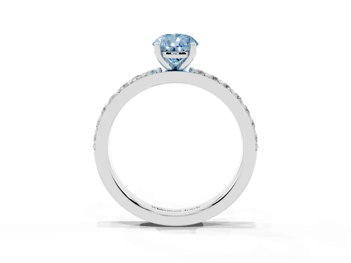 Fancy Blue Pear Cut Cut Diamond Solitaire with Pave Band and Four-Prong Setting Silver