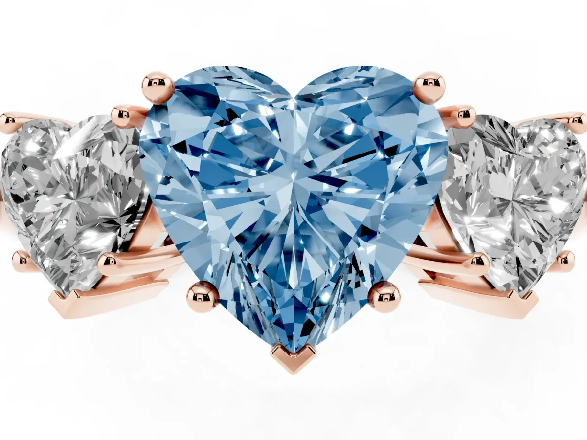 Fancy Blue Three-Stone Heart Cut Cut Diamond Engagement Ring with Prong Setting on a White Gold Band Rose gold