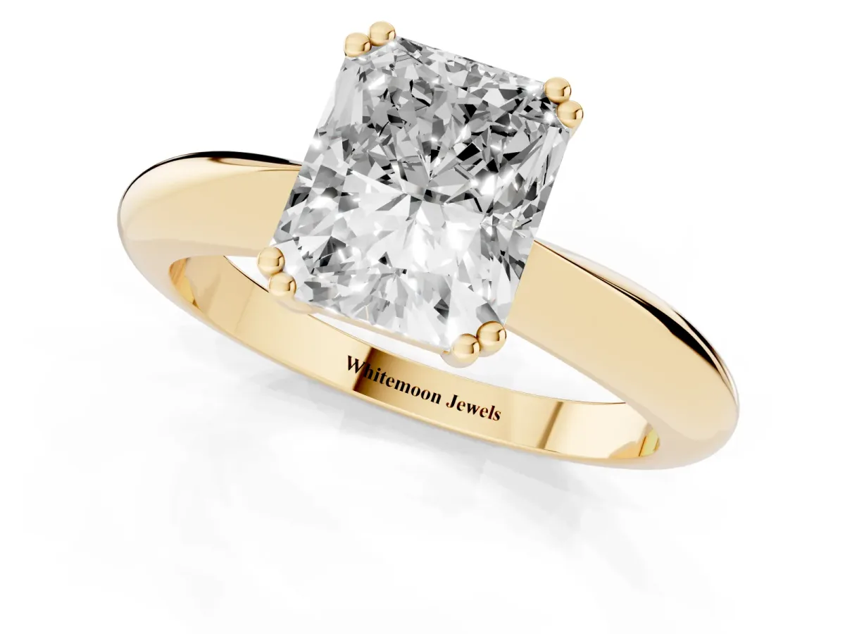 Radiant Cut Cut Solitaire Engagement Ring with Tapered Band and Four-Prong Setting Yellow gold