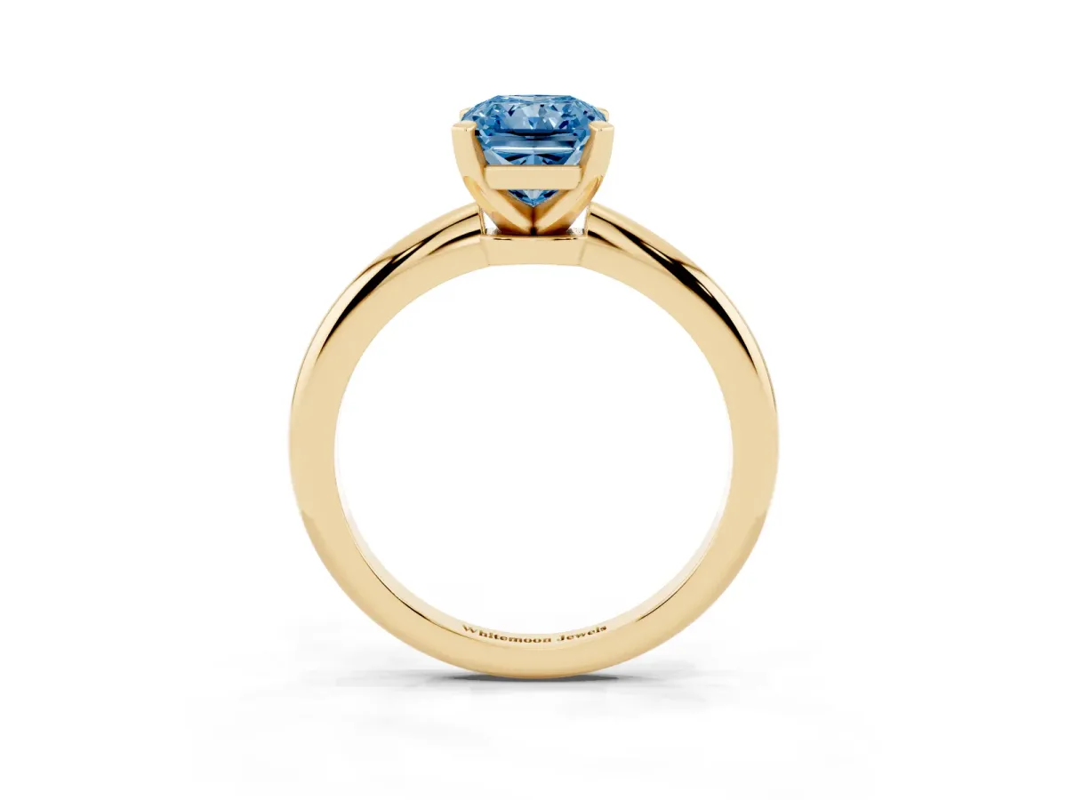 Fancy Blue Radiant Cut Diamond Solitaire Ring with Prong Setting and Classic Band Yellow gold