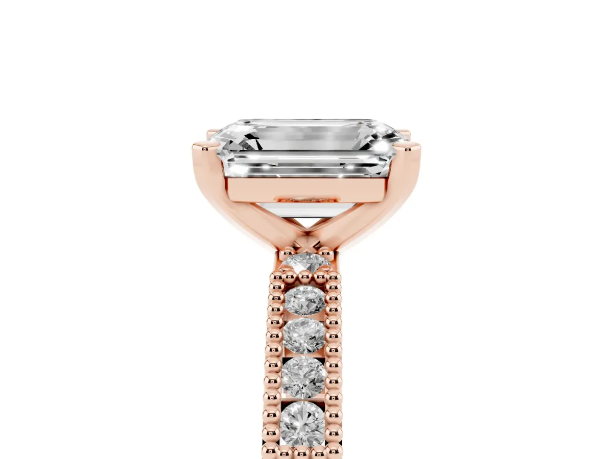 Emerald Cut Solitaire with Pavé Band and Four-Prong Setting Rose gold