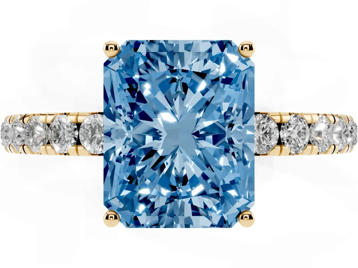 Fancy Blue Radiant Cut Diamond Pavé Solitaire Engagement Ring with Four-Prong Setting Yellow gold