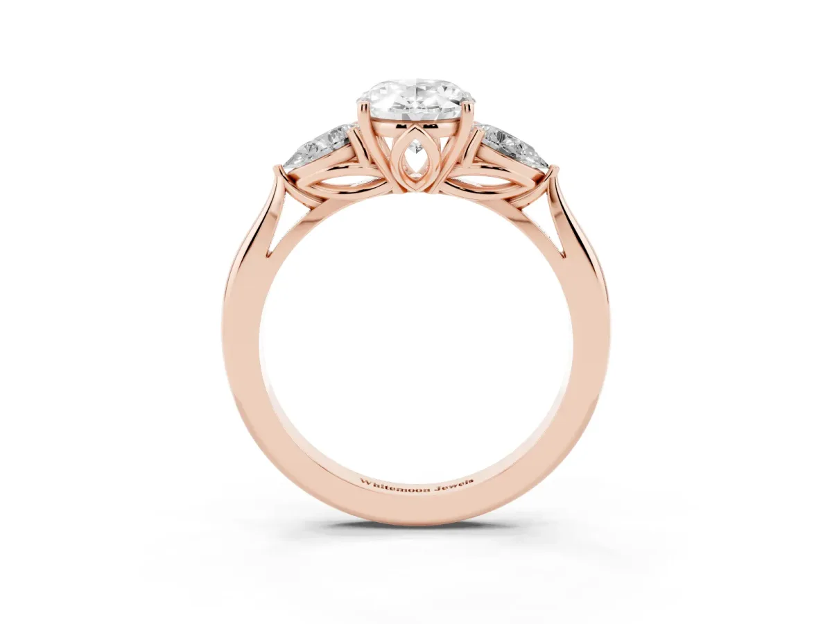Oval Cut Diamond Three-Stone Ring with Pear Side Stones and Prong Setting Rose gold