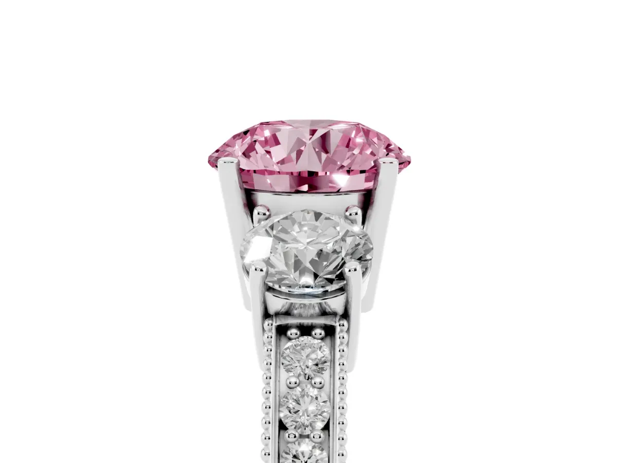 Fancy Pink Round Cut Three-Stone Diamond Ring with Pavé Band and Four-Prong Setting Silver