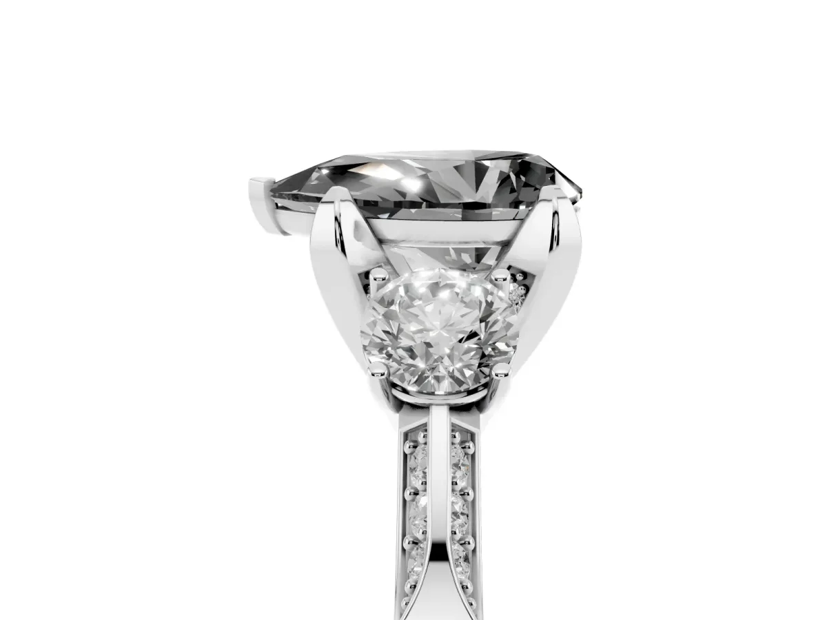 Fancy Black Pear Cut Brilliant Three-Stone Diamond Ring with Pavé Band and Four-Prong Setting Platinum