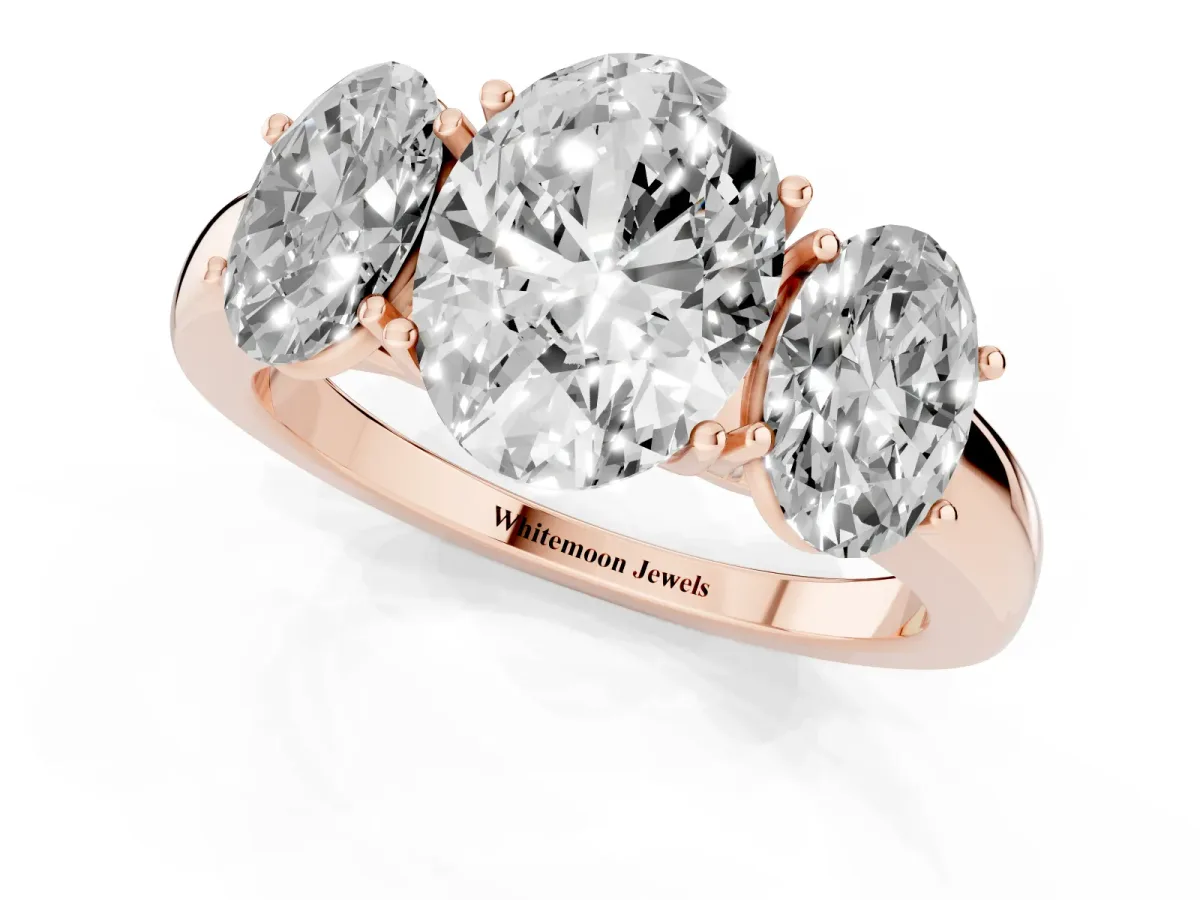 Oval Cut Diamond Three-Stone Ring with Four-Prong Setting and Classic Band Rose gold