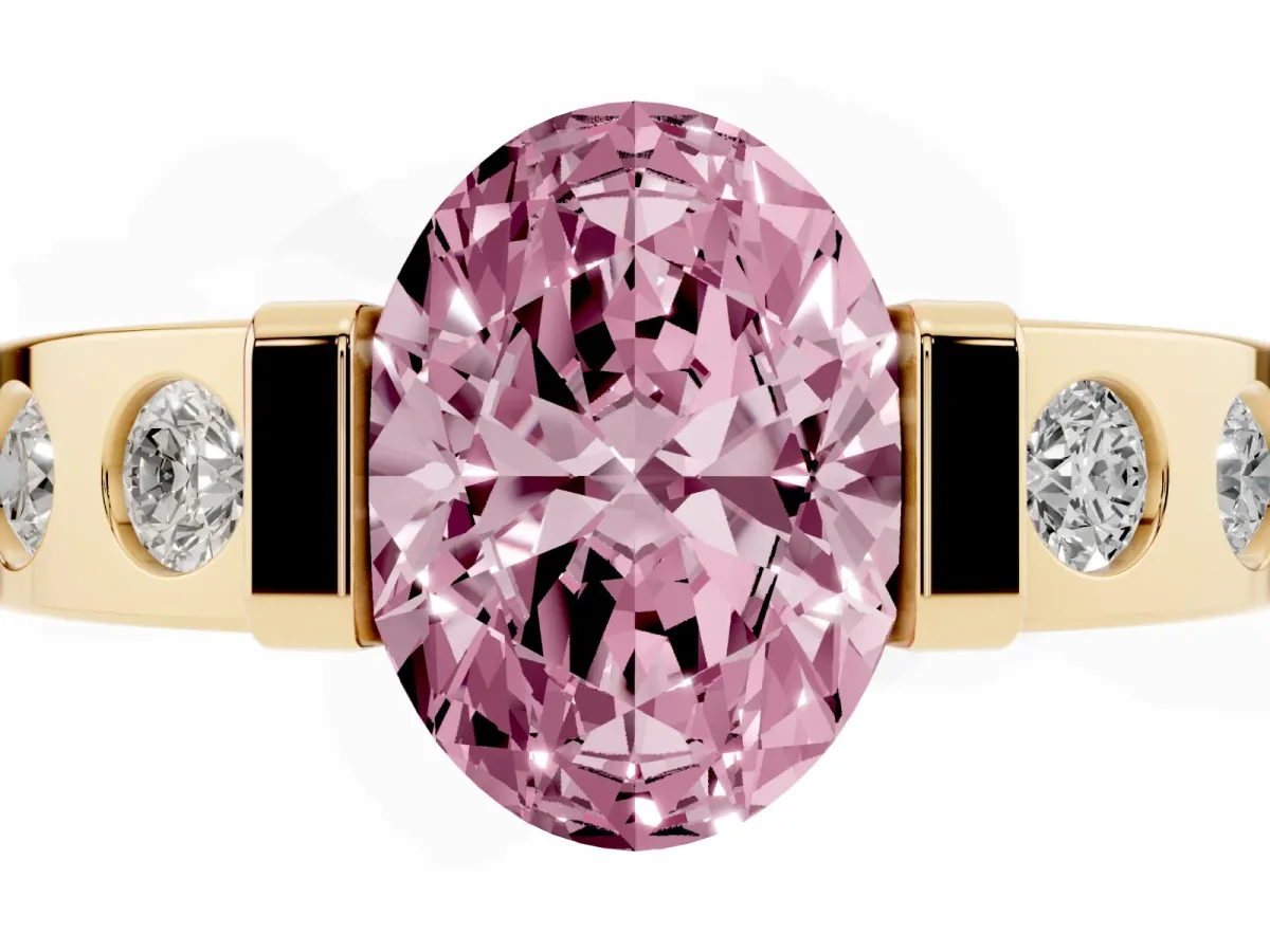 Fancy Pink Oval Cut Brilliant Channel-Set Diamond Ring with Bezel Prong Setting Yellow gold