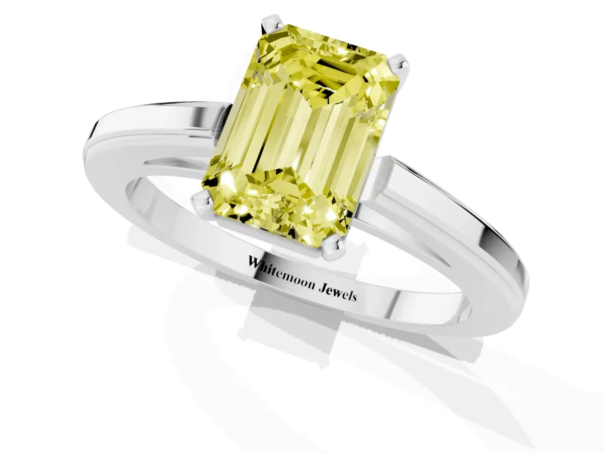 Fancy Yellow Emerald Cut Solitaire Diamond Ring with Four-Prong Setting and Classic Band Silver