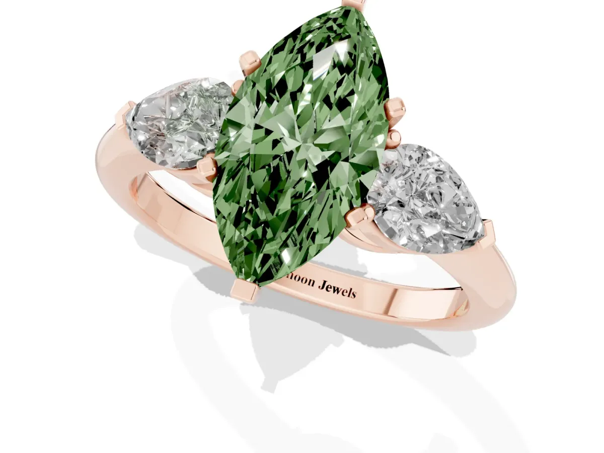 Fancy Green Three-Stone Marquise Cut Diamond Ring with Pear Side Stones and Four-Prong Setting Rose gold