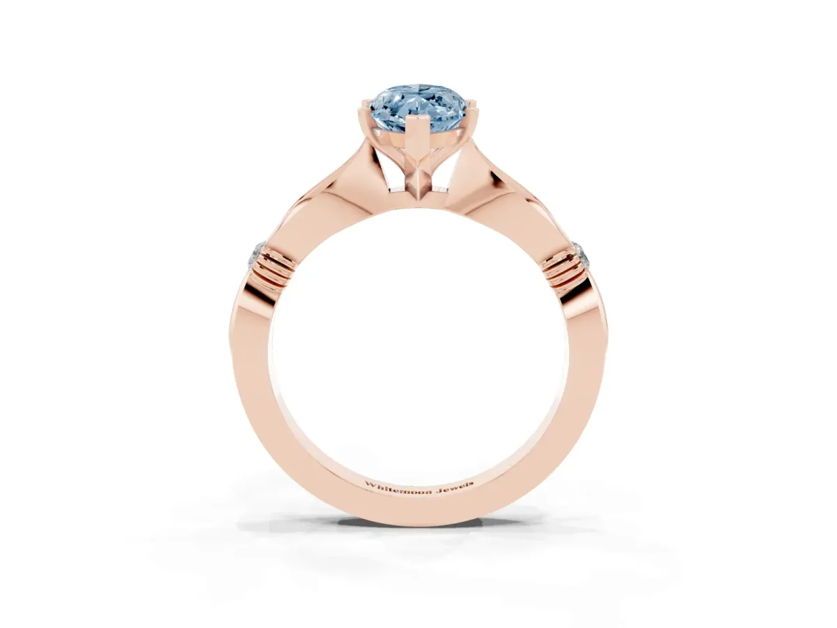 Fancy Blue Marquise Cut Solitaire Diamond Twisted Band with Four-Prong Setting Rose gold