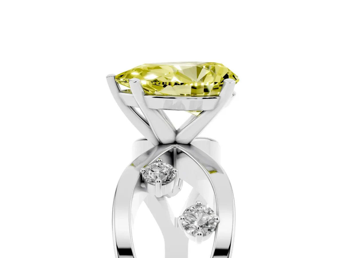 Fancy Yellow Pear Cut Cut Solitaire Diamond with Side Stones on Criss-Cross Band and Four-Prong Setting Silver