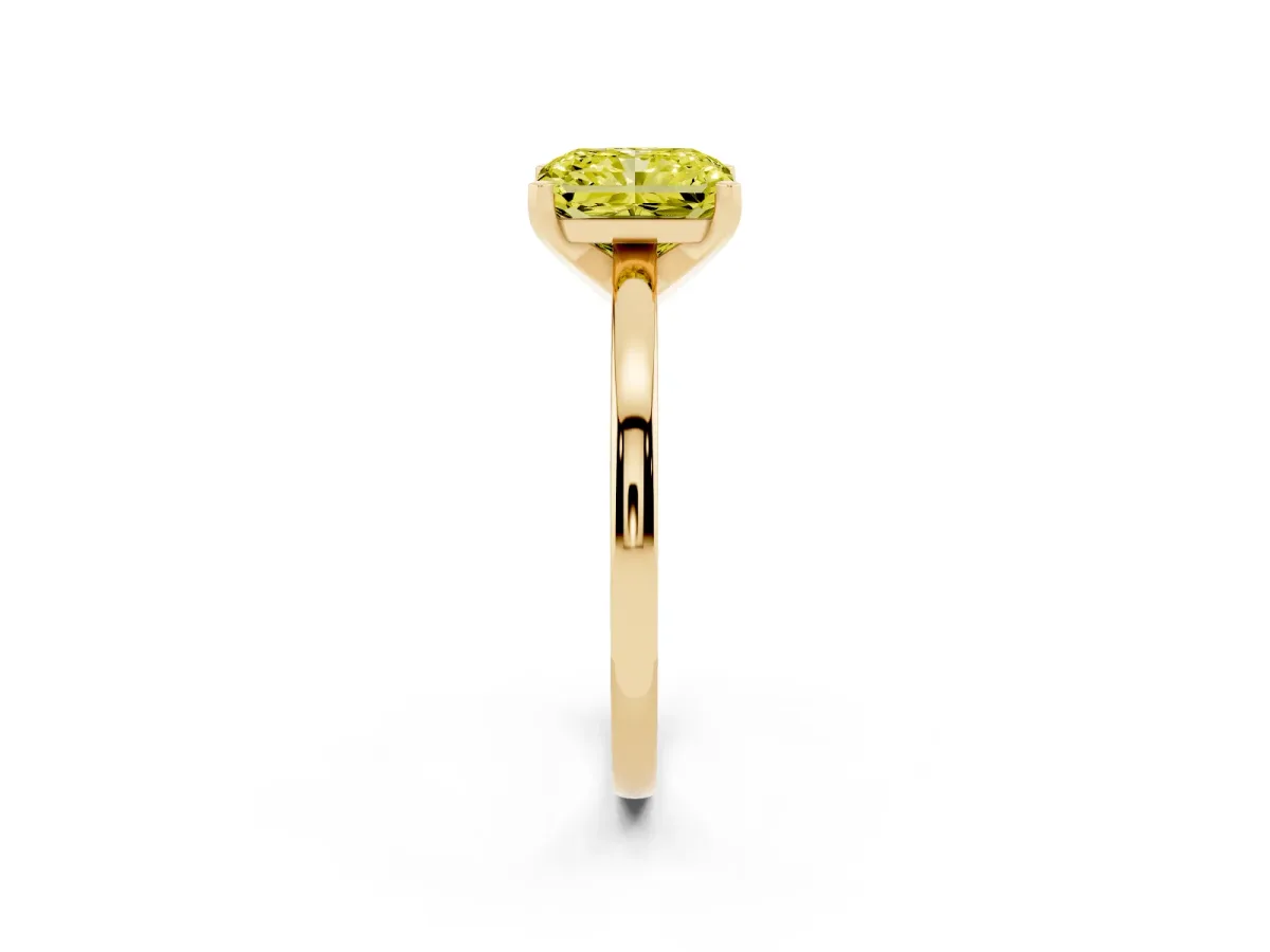 Fancy Yellow Radiant Cut Solitaire Diamond Engagement Ring with Four-Prong Setting on a Classic Band Yellow gold