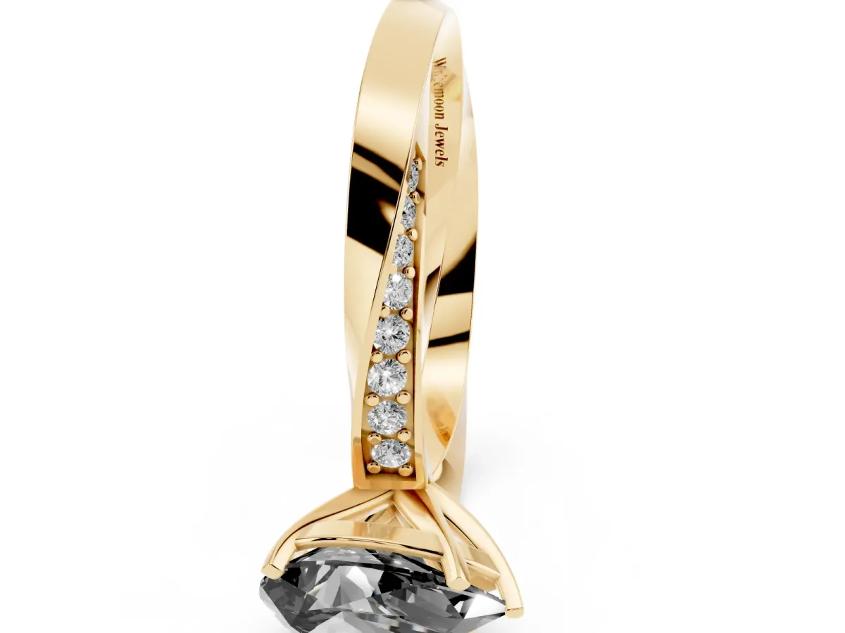 Fancy Black Pear Cut Diamond Engagement Ring with Side Stone Accents and Four-Prong Setting Yellow gold