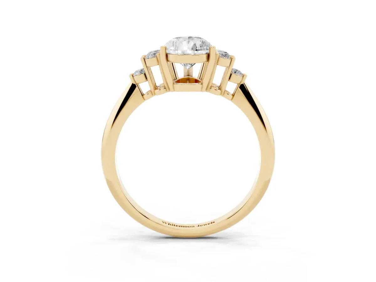 Pear Cut Cut Diamond Cluster Ring with Solitaire Band and Four-Prong Setting Yellow gold