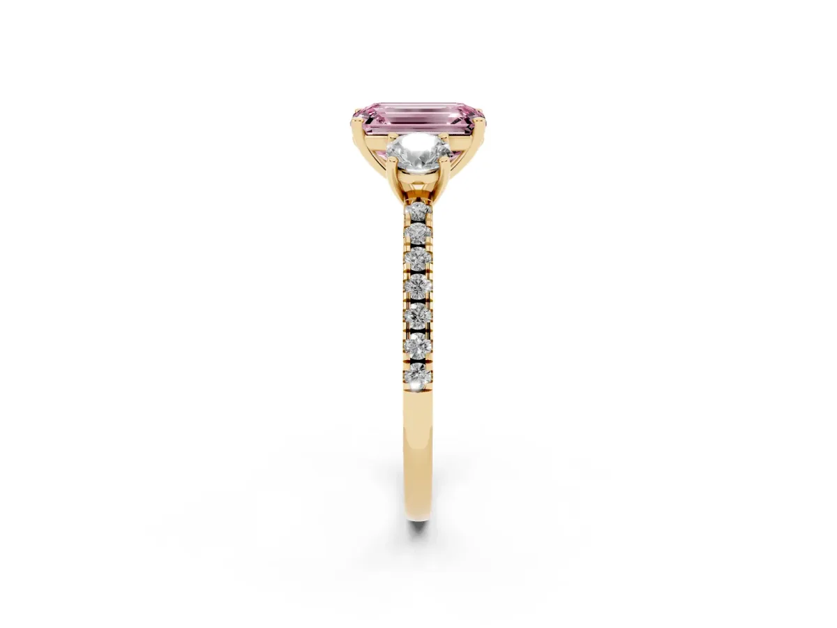 Fancy Pink Three-Stone Emerald Cut Cut Diamond Pavé Band with Prong Setting Yellow gold