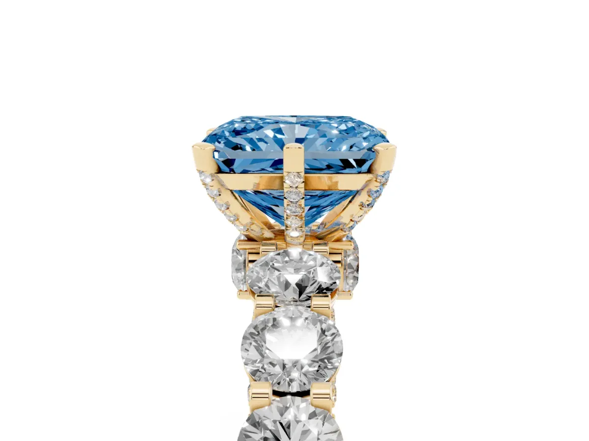 Fancy Blue Radiant Cut Diamond Side Stone Engagement Ring with Four-Prong Setting Yellow gold
