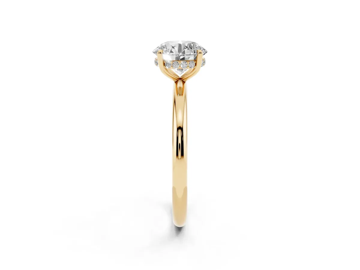 Round Cut Diamond Solitaire Ring with Thin Band and Four-Prong Setting Yellow gold