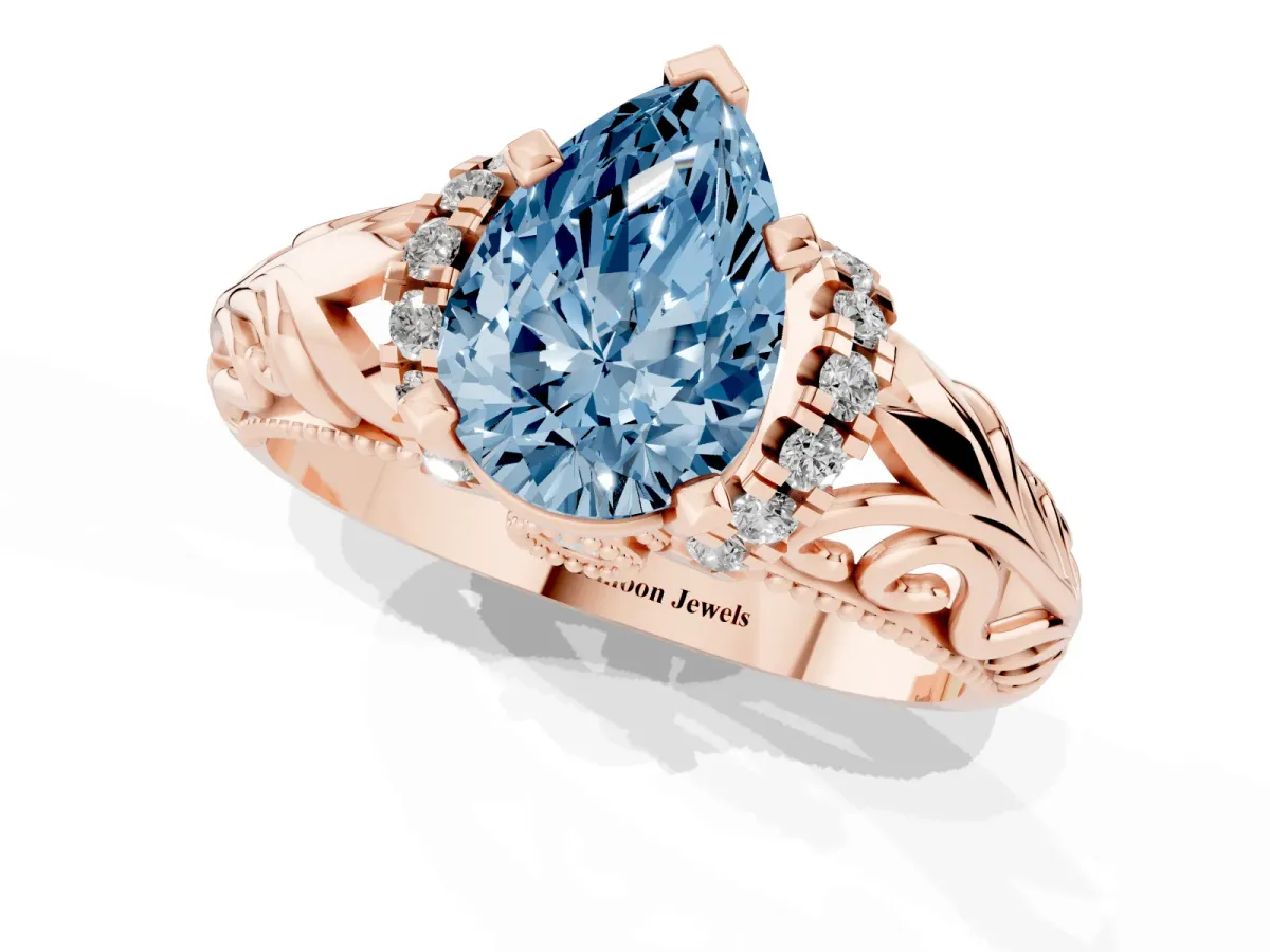 Fancy Blue Pear Cut Solitaire Filigree Engagement Ring with Halo and Prong Setting Rose gold