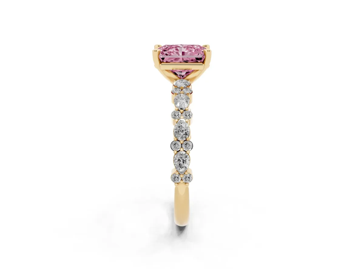 Fancy Pink Radiant Cut Diamond Side Stone Solitaire Ring with Round and Four-Prong Setting Yellow gold