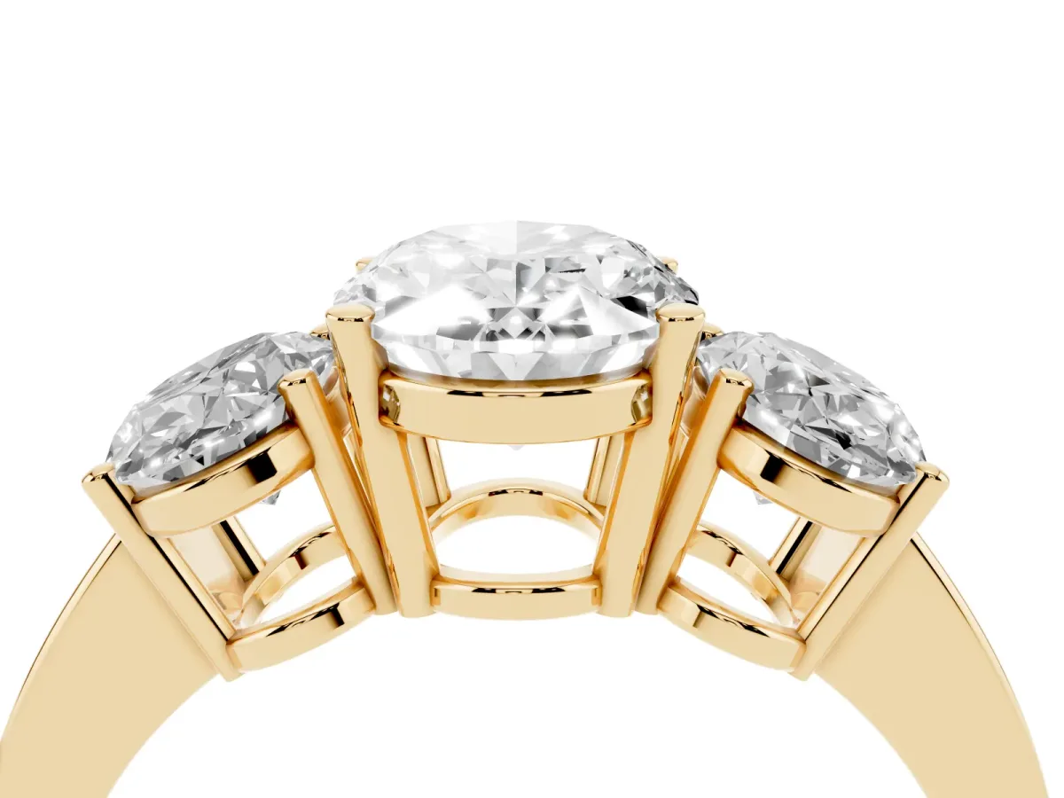 Three-Stone Oval Cut Cut Diamond Engagement Ring with Flat Band and Four-Prong Setting Yellow gold