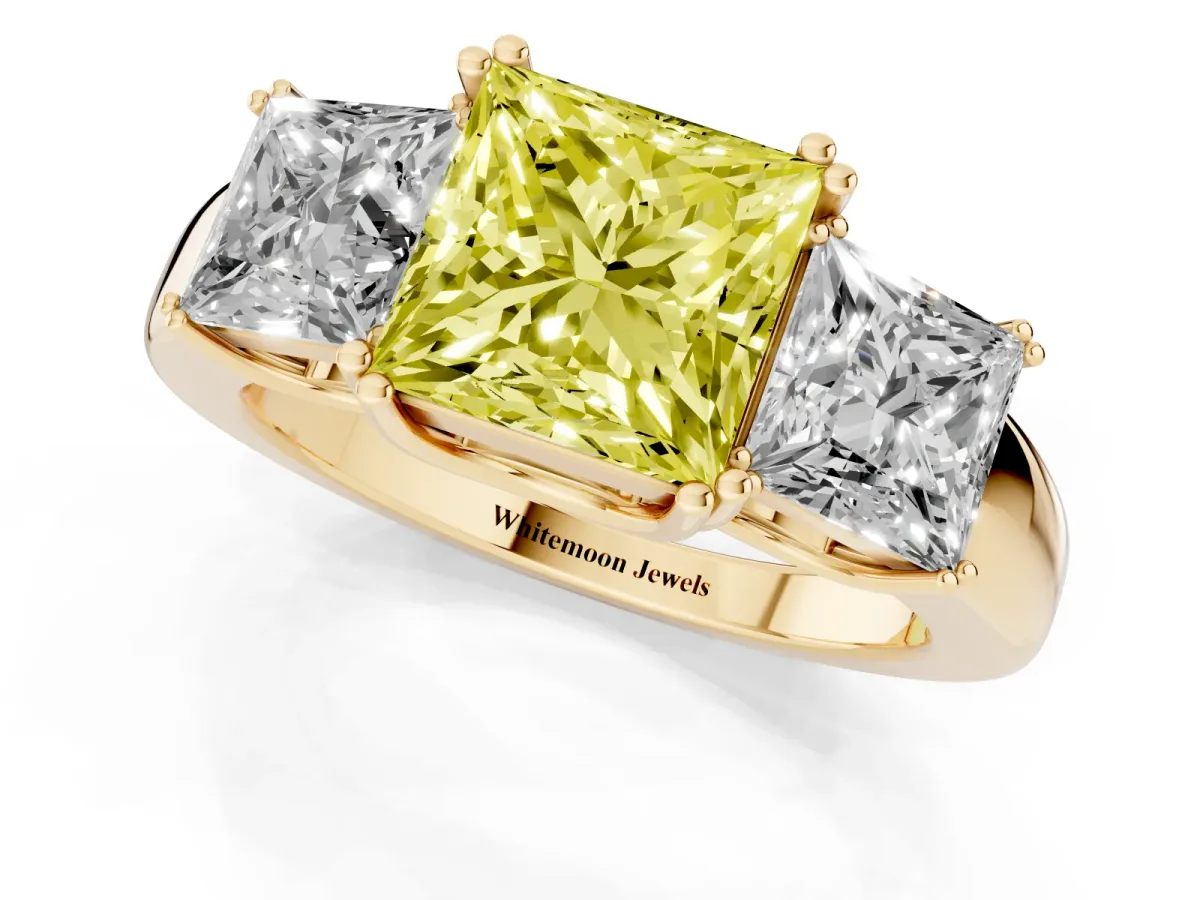 Fancy Yellow Three-Stone Princess Cut Cut Diamond Ring with Channel Set Band and Four-Prong Setting Yellow gold