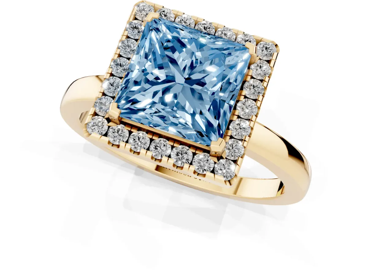 Fancy Blue Princess Cut Halo Diamond Solitaire with Pavé Band and Four-Prong Setting Yellow gold