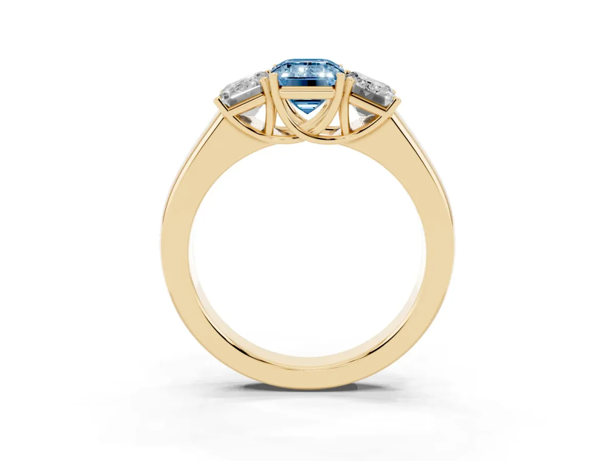 Fancy Blue Three-Stone Emerald Cut Cut Diamond Ring with Prong Setting and Classic Band Yellow gold