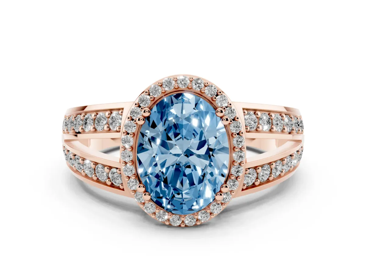 Fancy Blue Oval Cut Diamond Halo Ring with Split Shank Pavé Band and Four-Prong Setting Rose gold