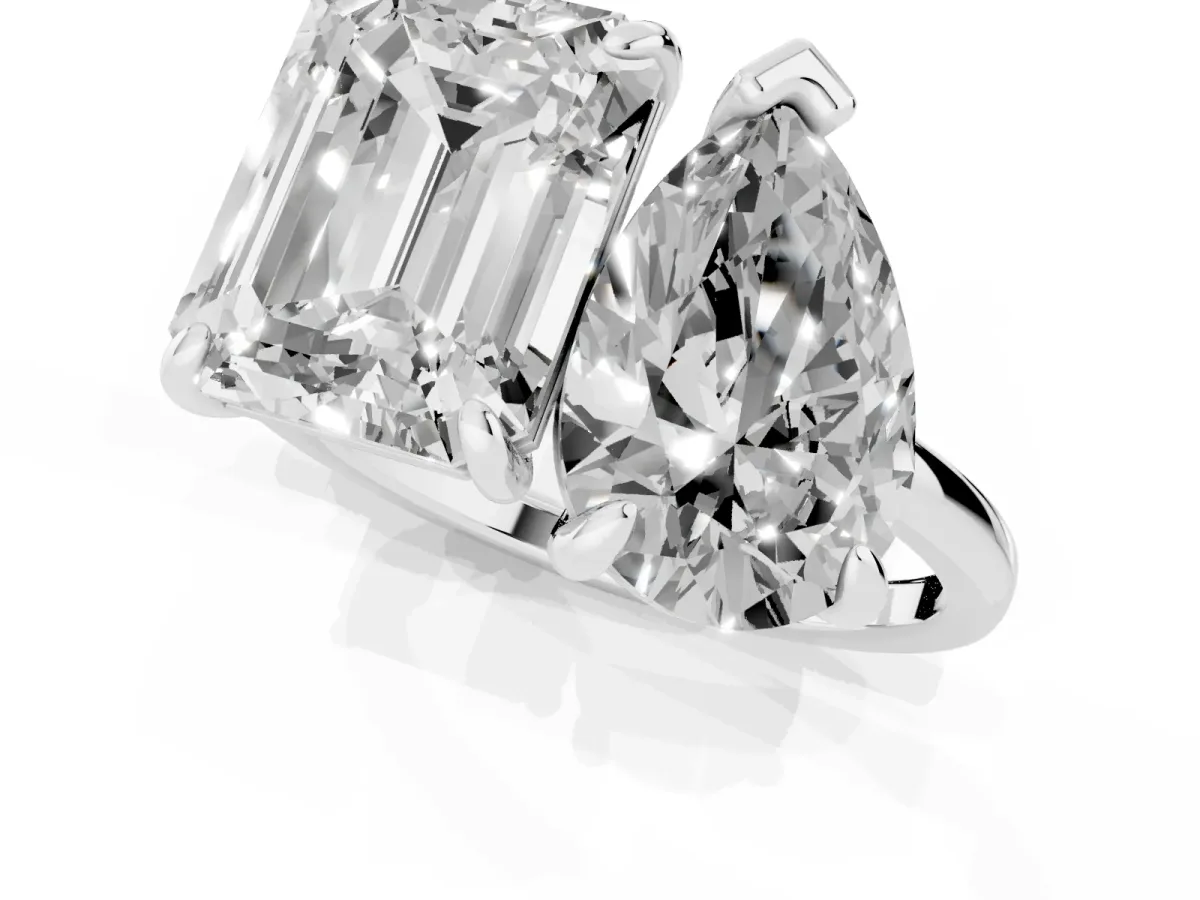 Pear and Emerald Toi Moi Ring with Prong Setting and Plain Band Silver