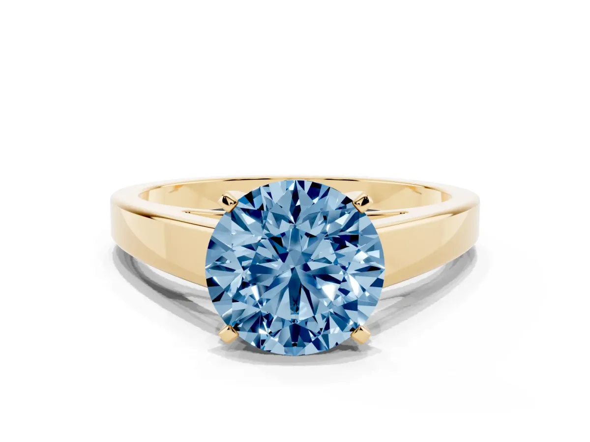 Fancy Blue Round Cut Solitaire Engagement Ring with Four-Prong Setting and Tapered Band Yellow gold