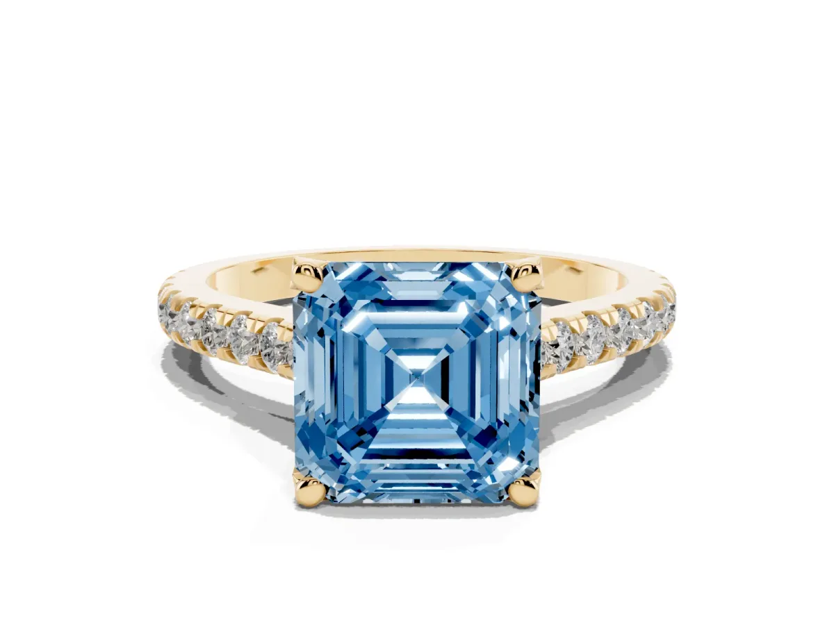 Fancy Blue Asscher Cut Brilliant Diamond Solitaire with Pavé Band and Four-Prong Setting Yellow gold